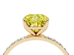 Fancy Yellow Cushion Cut Diamond Solitaire Engagement Ring Set in Yellow gold with Round Pavé Band and Prong Setting