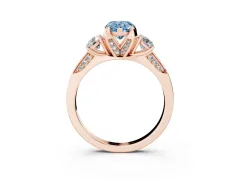 Fancy Blue Pear Cut Diamond Three-Stone Ring Set in Rose gold with Pavé Band and Smaller Side Stones