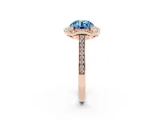 Fancy Blue Round Cut Diamond Halo Ring Set in Rose gold with Pavé-Lined Shoulders and Prong Setting
