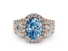 Fancy Blue Oval Cut Diamond Halo Split Shank Ring Set in Rose gold with Round Accent Stones and Prong Setting