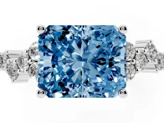 Fancy Blue Radiant Cut Diamond Ring Set in Platinum with Scattered Round Accents