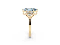 Fancy Blue Marquise Cut Diamond Solitaire Ring Set in Yellow gold with Cluster Accents on Each Side