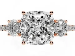 Cushion Cut Diamond Three-Stone Ring Set in Rose gold with Pavé Band and Graduated Sides