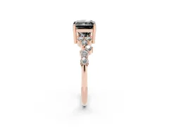 Fancy Black Radiant Cut Diamond Ring Set in Rose gold with Scattered Round Accents