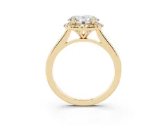 Oval Cut Diamond Halo Engagement Ring Set in Yellow gold with Pavé Band and Rising Shoulders