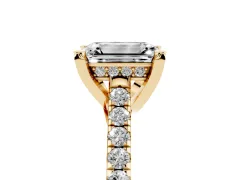 Emerald Cut Diamond Solitaire Ring Set in Yellow gold with Brilliant Pavé Band and Prong Setting