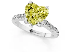 Fancy Yellow Heart Cut Diamond Solitaire Ring Set in White gold with Brilliant Pavé Band and Prong Setting