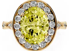 Fancy Yellow Oval Cut Diamond Halo Engagement Ring Set in Yellow gold with Twisted Band and Prong Setting