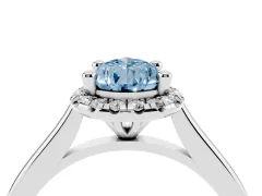 Fancy Blue Pear Cut Diamond Halo Engagement Ring Set in White gold with Pavé Band and Rising Shoulders