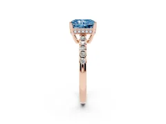 Fancy Blue Radiant Cut Diamond Solitaire Engagement Ring Set in Rose gold with Pavé Band and Prong Setting