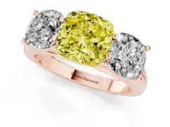 Fancy Yellow Cushion Cut Diamond Three-Stone Ring Set in Rose gold with Plain Polished Band