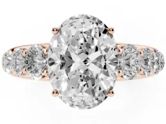 Oval Cut Diamond Solitaire Ring Set in Rose gold with Pavé-Set Band and Prong Setting