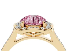 Fancy Pink Round Cut Diamond Halo Ring Set in Yellow gold with Pavé-Lined Shoulders and Prong Setting