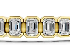 Emerald Cut Diamond Tennis Bracelet Set in Yellow gold with Half Bezel Setting