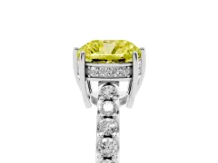 Fancy Yellow Cushion Cut Diamond Solitaire Engagement Ring Set in Platinum with Pavé Band and Prong Setting