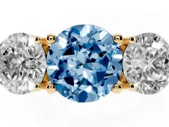Fancy Blue Round Cut Diamond Three-Stone Ring Set in Yellow gold with Prong Setting and Plain Band