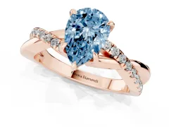 Fancy Blue Pear Cut Diamond Twisted Pavé Band Ring Set in Rose gold with Prong Setting