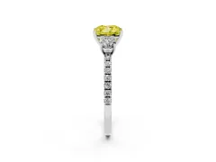 Fancy Yellow Cushion Cut Diamond Three-Stone Ring Set in White gold with Pavé Band and Graduated Sides