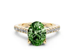 Fancy Green Oval Cut Diamond Solitaire Ring Set in Yellow gold with Brilliant Pavé Band and Prong Setting