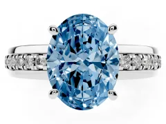 Fancy Blue Oval Cut Diamond Solitaire Ring Set in White gold with Channel Set Band and Prong Setting
