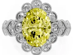 Fancy Yellow Oval Cut Diamond Solitaire Ring Set in White gold with Milgrain Pavé Heart Band
