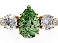 Fancy Green Pear Cut Diamond Three-Stone Ring Set in Yellow gold with Round Side Stones and Pavé Band