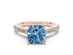 Fancy Blue Cushion Cut Diamond Solitaire Ring Set in Rose gold with Brilliant Pavé Band and Prong Setting