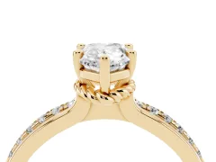 Pear Cut Diamond Solitaire Ring Set in Yellow gold with Channel Set Band and Prong Setting