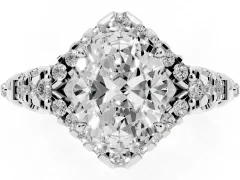 Oval Cut Diamond Solitaire Ring Set in Platinum with Hidden Halo and Pavé Band