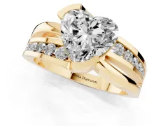 Heart Cut Diamond Solitaire Ring Set in Yellow gold with Channel Set Split Shank and Tension Prongs