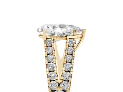 Pear Cut Diamond Split Shank Pavé Engagement Ring Set in Yellow gold with Prong-Held Center Stone