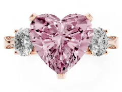 Fancy Pink Heart Cut Diamond Three-Stone Ring Set in Rose gold with Pavé Band and Smaller Side Stones