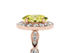 Fancy Yellow Oval Cut Diamond Halo Engagement Ring Set in Rose gold with Twisted Band and Prong Setting