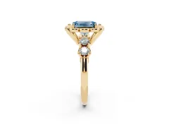 Fancy Blue Emerald Cut Diamond Floral Halo Ring Set in Yellow gold with Shared Prong Band
