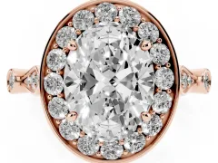 Oval Cut Diamond Halo Engagement Ring Set in Rose gold with Twisted Band and Prong Setting