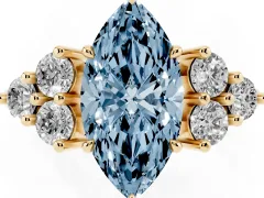 Fancy Blue Marquise Cut Diamond Solitaire Ring Set in Yellow gold with Cluster Accents on Each Side