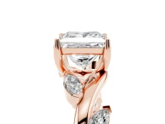 Princess Cut Diamond Solitaire Ring Set in Rose gold with Twisted Marquise Accent Band