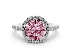 Fancy Pink Round Cut Diamond Halo Ring Set in Platinum with Pavé Shoulders and Halo-Framed Center