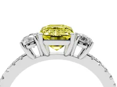 Fancy Yellow Emerald Cut Diamond Three-Stone Ring Set in Platinum with Pavé Band and Graduated Sides