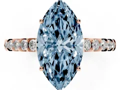 Fancy Blue Marquise Cut Diamond Solitaire Engagement Ring Set in Rose gold with Pavé Band and Prong Setting