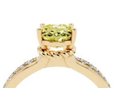 Fancy Yellow Oval Cut Diamond Solitaire Ring Set in Yellow gold with Channel Set Band and Prong Setting