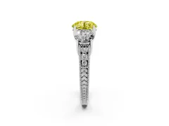 Fancy Yellow Round Cut Diamond Three-Stone Engagement Ring Set in Platinum with Milgrain Pavé Band