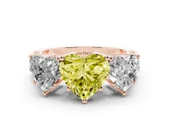 Fancy Yellow Heart Cut Diamond Three-Stone Ring Set in Rose gold with Textured Band