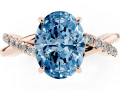 Fancy Blue Oval Cut Diamond Twisted Pavé Band Ring Set in Rose gold with Prong Setting