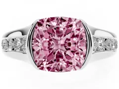 Fancy Pink Cushion Cut Diamond Bezel-Set Solitaire Ring Set in White gold with Channel-Set Band