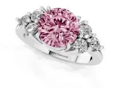 Fancy Pink Round Cut Diamond Solitaire Ring Set in Platinum with Cluster Accents on Each Side