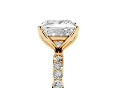 Princess Cut Diamond Solitaire Engagement Ring Set in Yellow gold with Round Pavé Band and Prong Setting