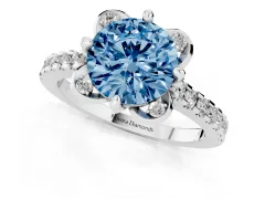 Fancy Blue Round Cut Diamond Solitaire Ring Set in White gold with Pavé Band and Floral Prong Setting