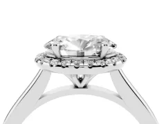 Oval Cut Diamond Halo Engagement Ring Set in White gold with Pavé Band and Rising Shoulders