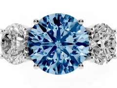 Fancy Blue Round Cut Diamond Three-Stone Ring Set in Platinum with Pavé Band